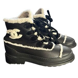 CHANEL Black Calfskin & White Shearling-Trim Lace-Up Combat Boots | Size 35 IT